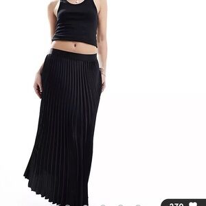 Black pleated midi skirt.